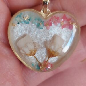 Jóia com dentinho na moldura